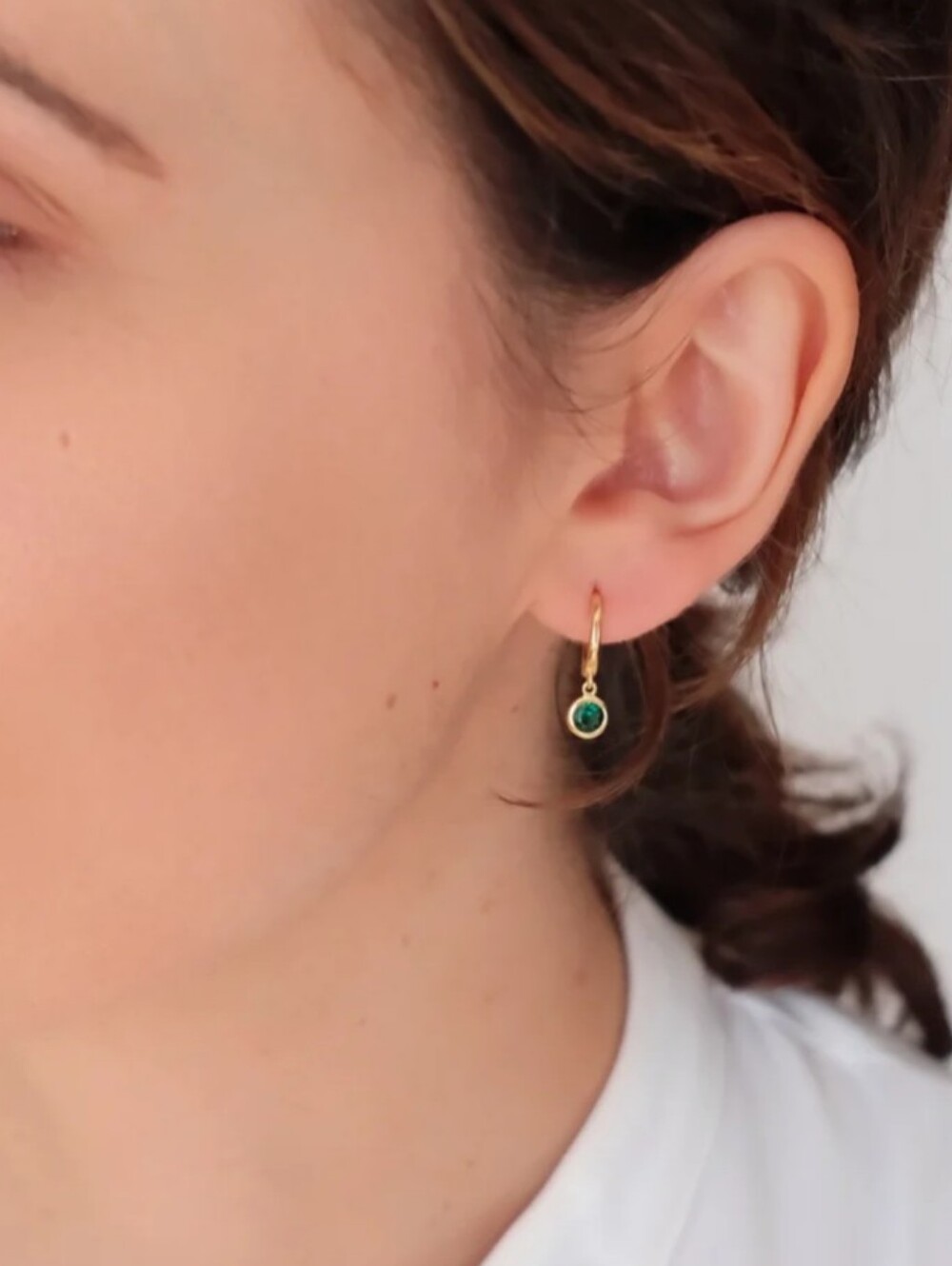 Perfect cond. waterproof gold plate oblong hoops w dangling Faux Emerald Stone